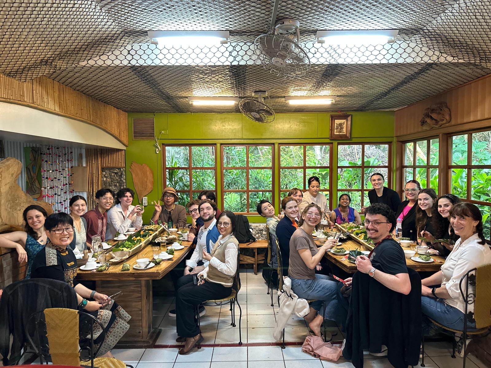 the trek cohort enjoying a group dinner