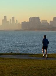 man running along the chicago lakefront