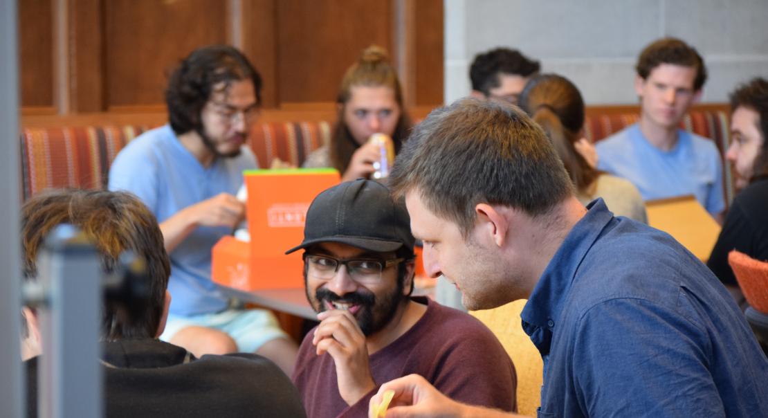 Daniil Iurchenko (PhD Student 2022) and Omkar Katta (PhD Student 2022) enjoy lunch at Autumn 2025 Orientation