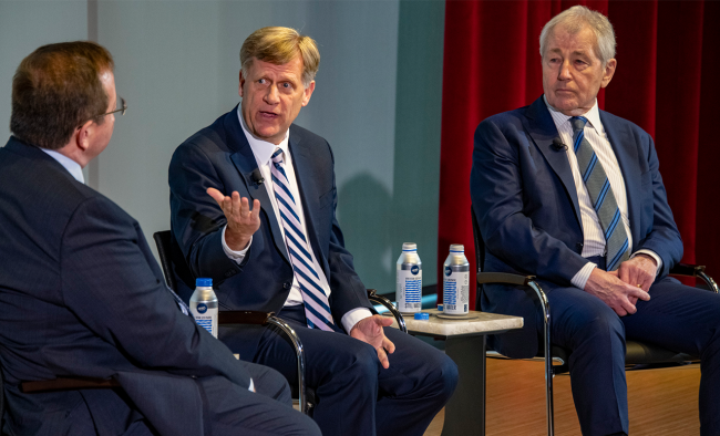 Prof. Robert Pape (left) moderates a conversation between former U.S. Ambassador to Russia Michael McFaul (center) and former Secretary of Defense Chuck Hagel during the Hagel Lecture March 24 at the Rubenstein Forum.