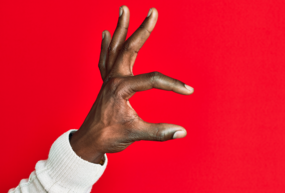 a hand gesturing in indication of something's size