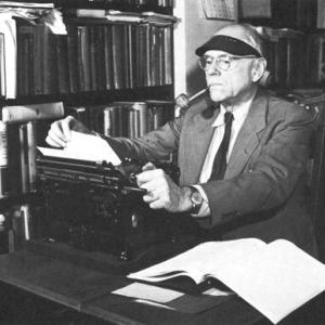 Frank Knight at a typewriter